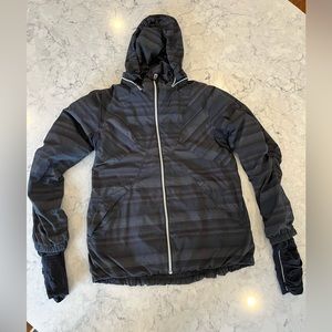Black lululemon jacket with very flattering rusching details. Size 8